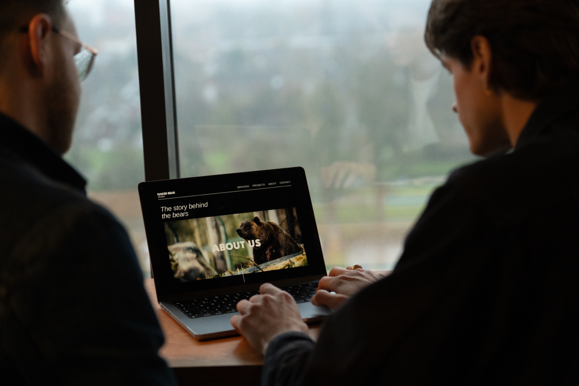 Team working together at a laptop